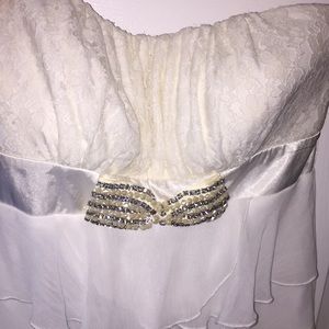 Cream and white strapless blouse